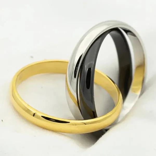 TRINITY RING BLACK GOLD SILVER