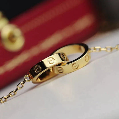 LOVE NECKLACE DOUBLE RING GOLD